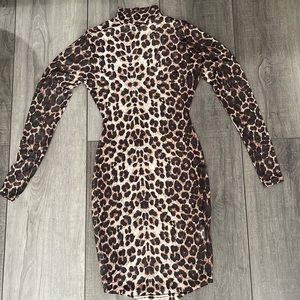 Mesh animal print mini dress. Runs small